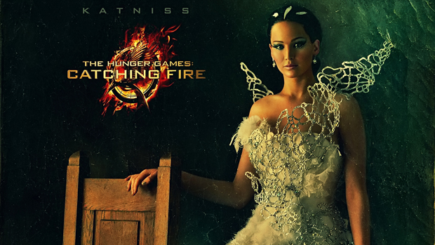 Personagem Katniss (Jennifer Lawrence), em cartaz do filme Jogos Vorazes: Em Chamas
