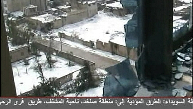 Prédios destruídos no bairro de Baba Amr, em Homs