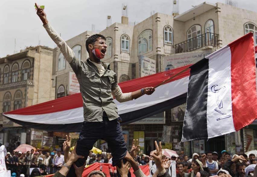 Manifestantes em protesto contra o governo de Ali Abdullah Saleh, Sanaa, Iêmen