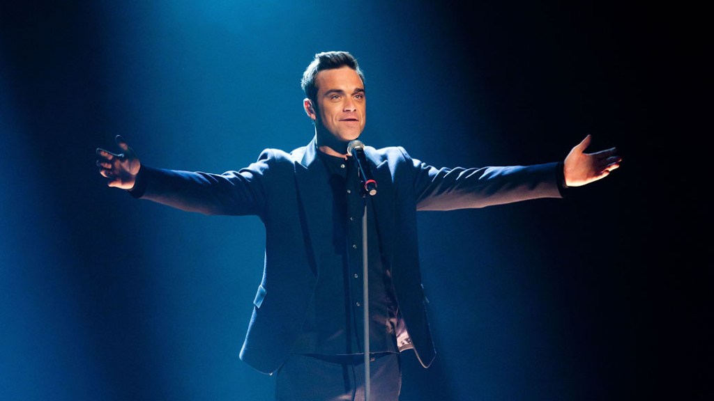 O cantor Robbie Williams durante apresentação na Alemanha - 12/02/2011