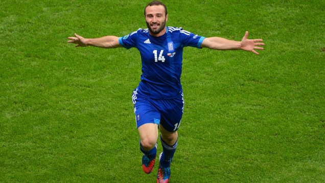 Salpigidis comemora o gol de empate da Grécia