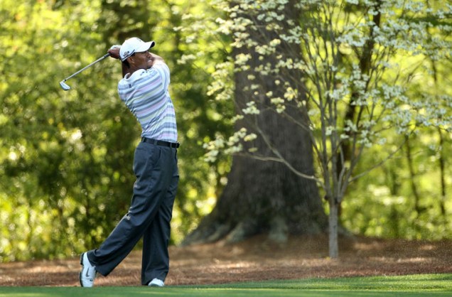Nesta segunda-feira, o golfista americano Tiger Woods treinou em público pela primeira vez após a divulgação, no fim do ano apssado, dos escândalos sexuais em que se envolveu.