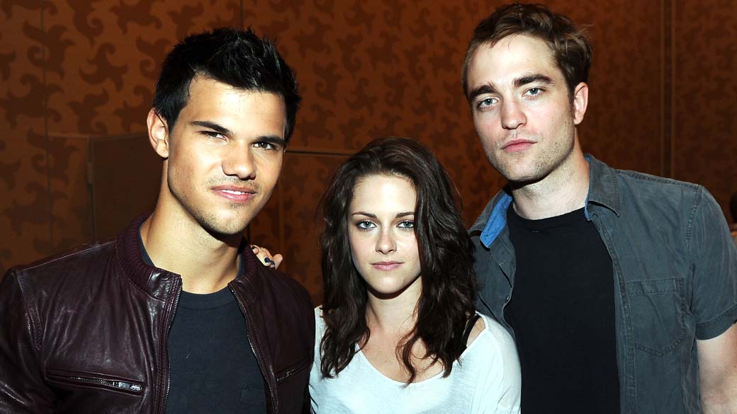 Taylor Lautner, Kristen Stewart e Robert Pattinson durante o Comic-Con 2011 na California, Estados Unidos