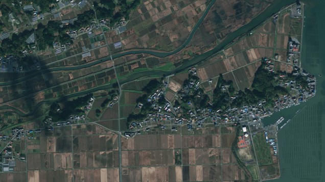 Imagem de satélite da cidade de Minami Sanriku antes do terremoto e tsunami que atingiram o Japão...
