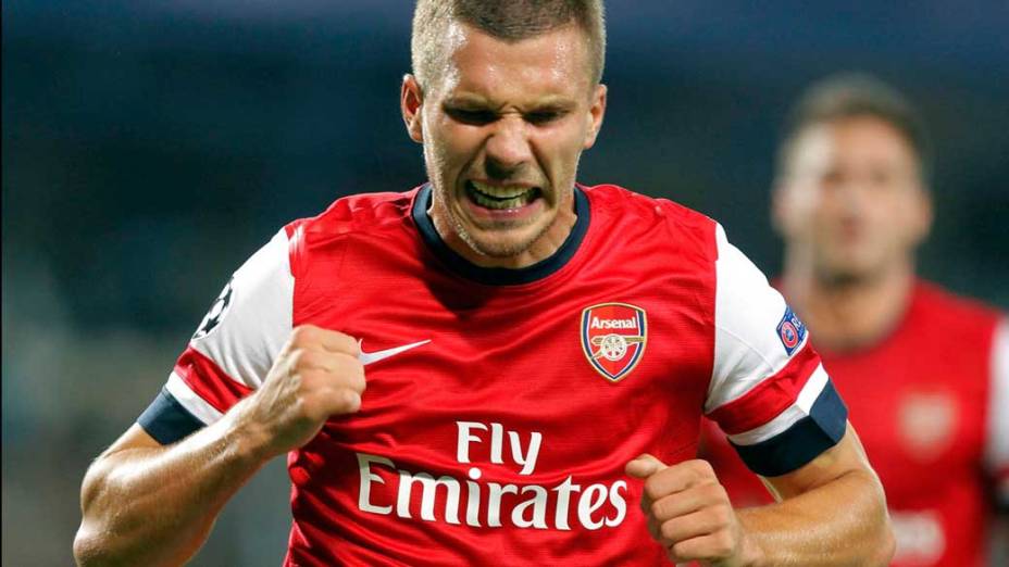 Lucas Podolski, do Arsenal, comemora gol sobre o Montpellier em partida válida pela primeira rodada da Liga dos Campeões da UEFA