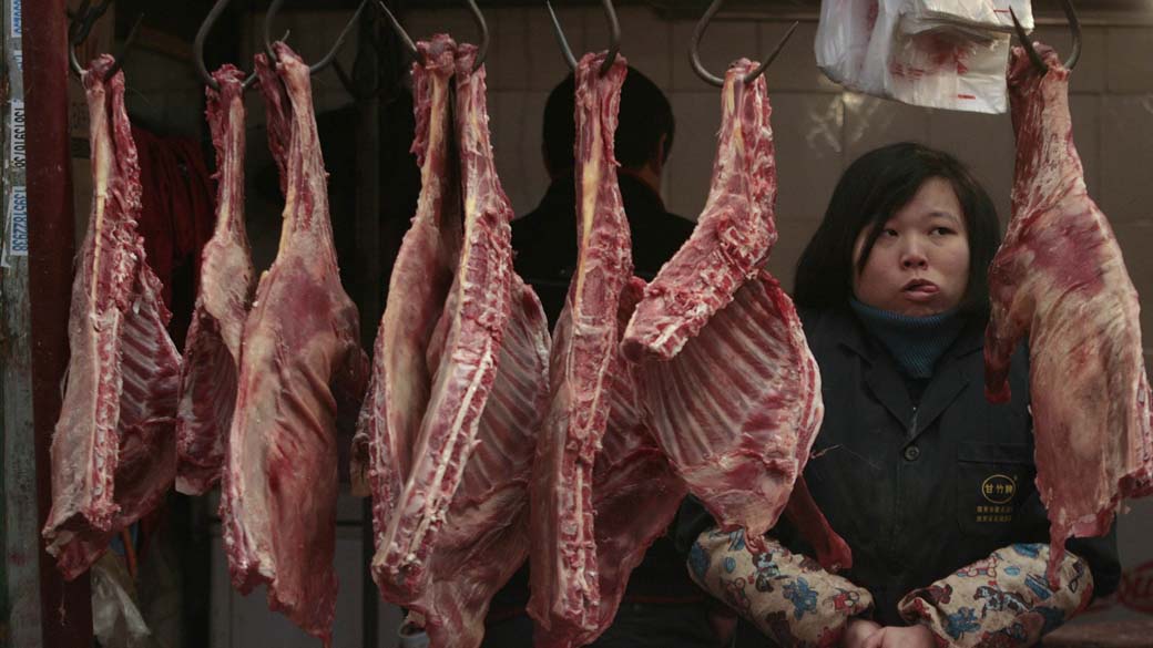 Vendedora em açougue em Nanjing, China