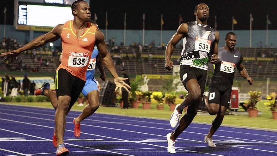 Yohan Blake (à esq.) finalizou a prova de 100 metros em 9s75; Bolt ficou em segundo