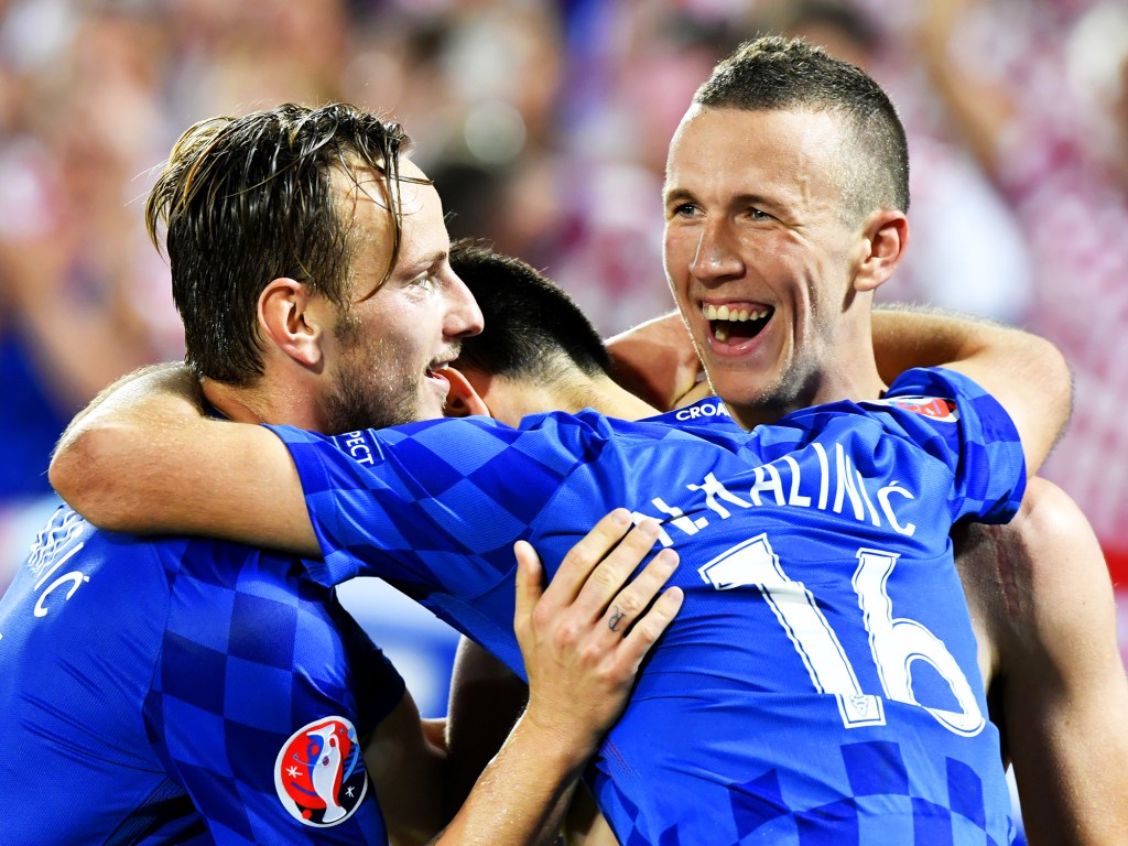 Ivan Perisic celebra o gol que garantiu a vitória da Croácia sobre a Espanha