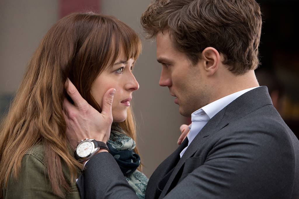 Dakota Johnson e Jamie Dornan em Cinquenta Tons de Cinza