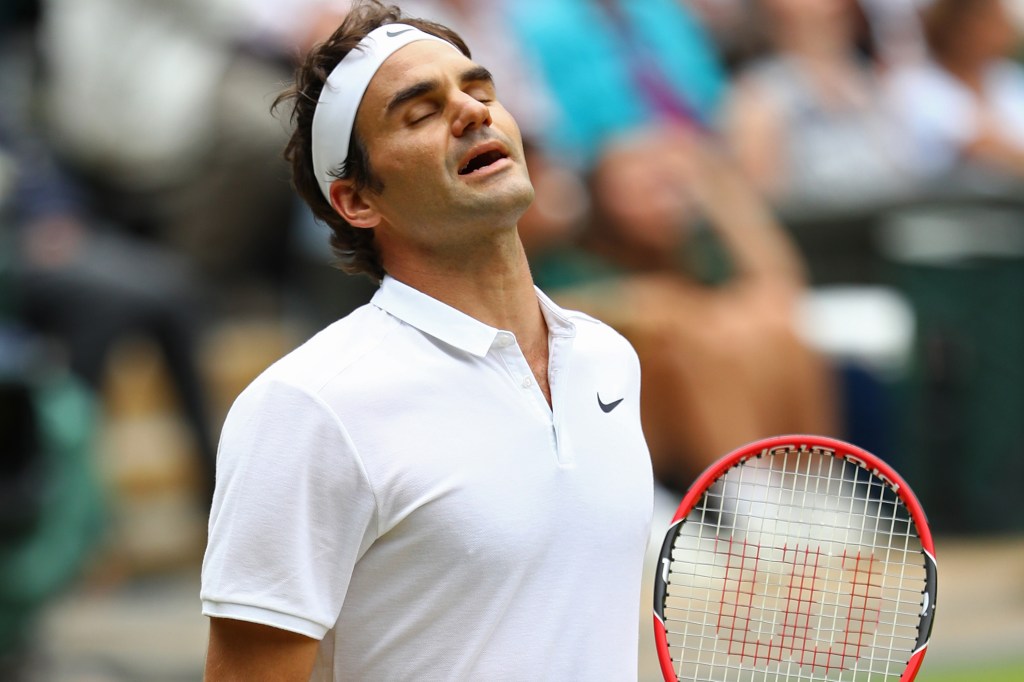 O suíço Roger Federer durante partida contra o canadense Milos Raonic do Canadá em Wimbledon
