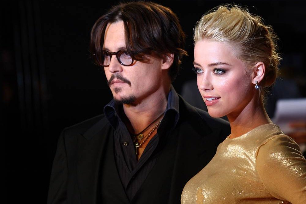 Amber Heard, conhecida principalmente como ex-mulher de Johnny Depp, f