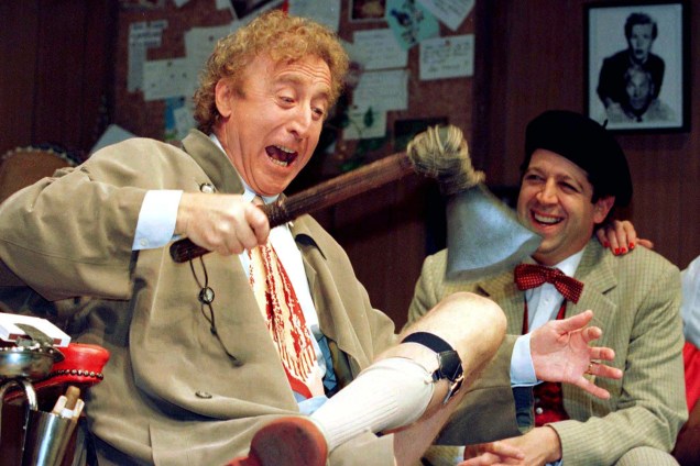 American actor Gene Wilder (L) performs alongside compatriot Rolf Saxon, during the rehearsal of a scene from Neil Simon's 'Laughter on the 23rd Floor', in New York, October 2, 1996. . REUTERS/Shawn Baldwin/File Photo