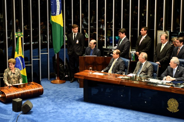 Suspended Brazilian President Dilma Rousseff (L) delivers her speech during the impeachment trial, at the National Congress in Brasilia, on August 29, 2016.
Rousseff arrived at the Senate to defend herself confronting her accusers in a dramatic finale to a Senate impeachment trial likely to end 13 years of leftist rule in Latin America's biggest country. / AFP PHOTO / EVARISTO SA