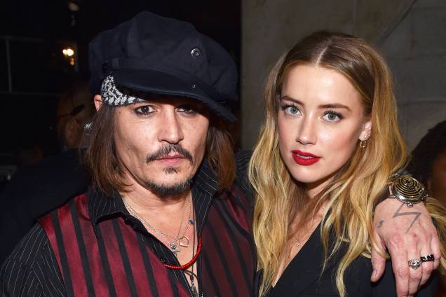 Os atores Johnnt Depp e Amber Heard durante a premiação do Grammy Awards, realizada no Staples Center, em Los Angeles (EUA) - 15/02/2016