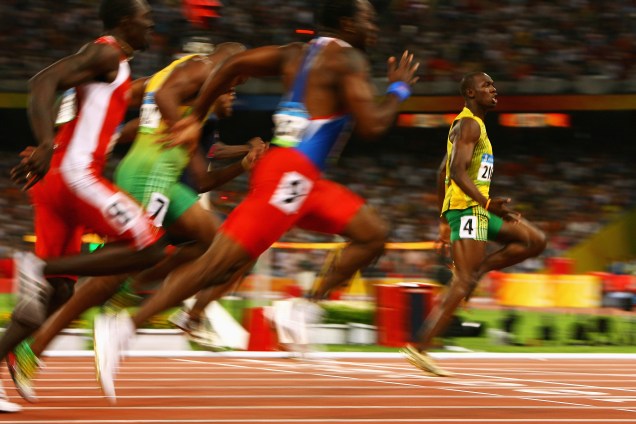 O jamaicano Usain Bolt conquistou seu primeiro ouro olímpico nos 100m em Pequim em 2008  com o tempo de 9.69s