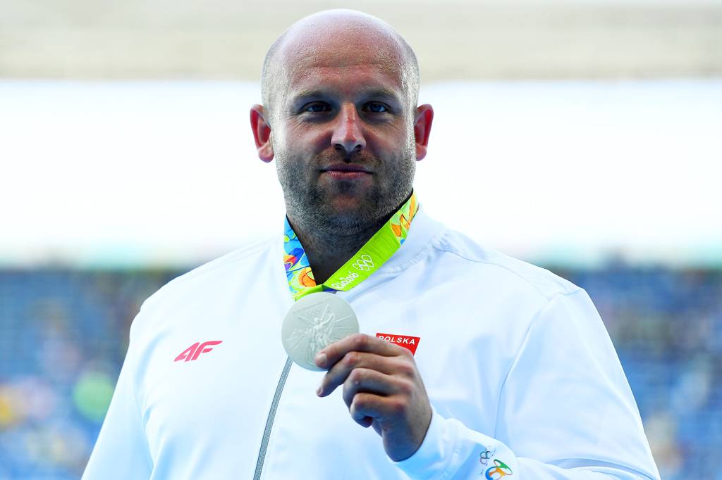 O atleta polonês Piotr Malachowski conquista a medalha de prata no arremesso de disco masculino, no Estádio Olímpico - 13/08/2016