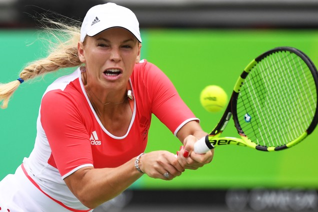 A tenista dinamarquesa Caroline Wozniacki, durante partida contra a checa Petra Kvitova, durante a segunda rodada do torneio de tênis de quadra feminino - 08/08/2016