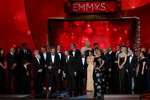Executive Producers David Benioff, center left, and D.B. Weiss accept the award for Oustanding Drama Series for "Game of Thrones" with the cast and crew at the 68th Primetime Emmy Awards in Los Angeles, California, U.S., September 18, 2016.  REUTERS/Mike Blake