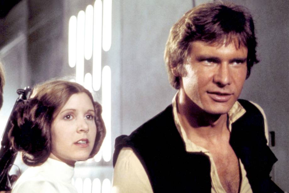 Carrie Fisher e Harrison Ford, em cena do filme 'Star Wars IV - Uma Nova Esperança' - 1977