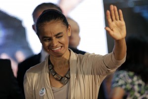 Former Senator Marina Silva reacts during a ceremony with the Former governor of Pernambuco state Eduardo Campos (not pictured) to announce their candidacies for president and vice president of Brazil in the general elections to be held next October, in Brasilia April 14, 2014. REUTERS/Ueslei Marcelino (BRAZIL - Tags: POLITICS ELECTIONS)