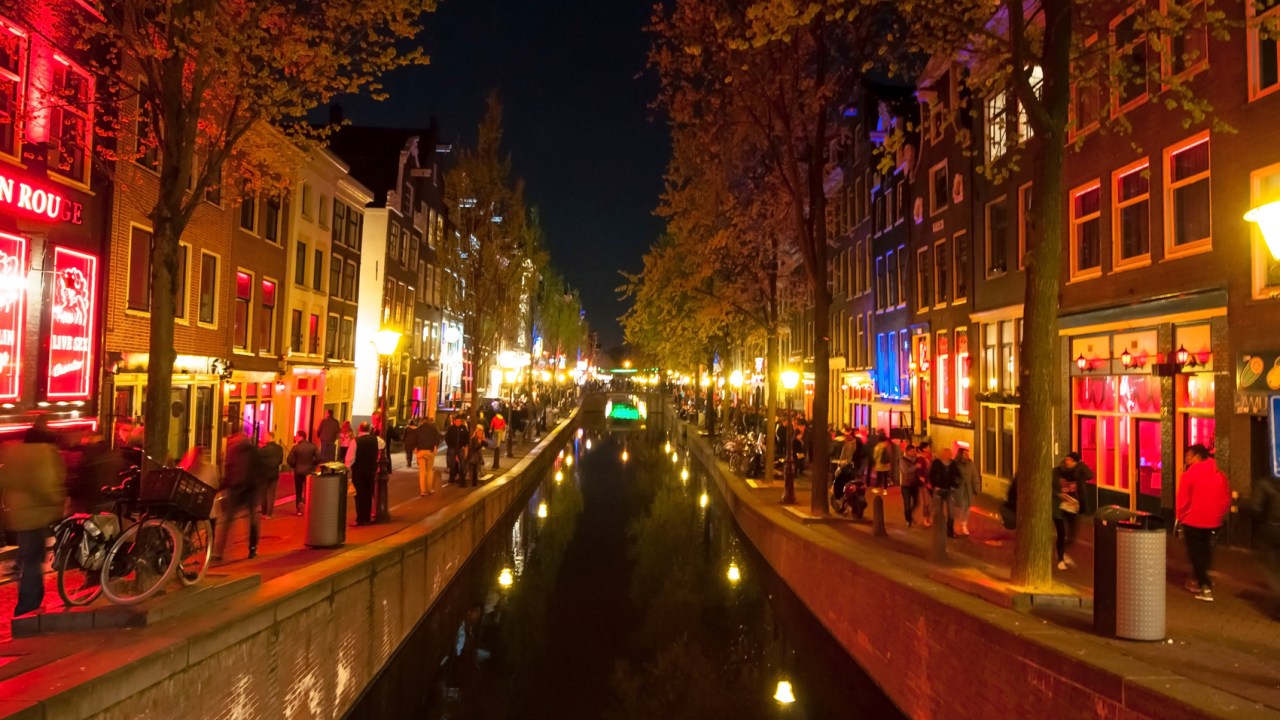 Red light district (Wallen) at night in Amsterdam, the Netherlands.