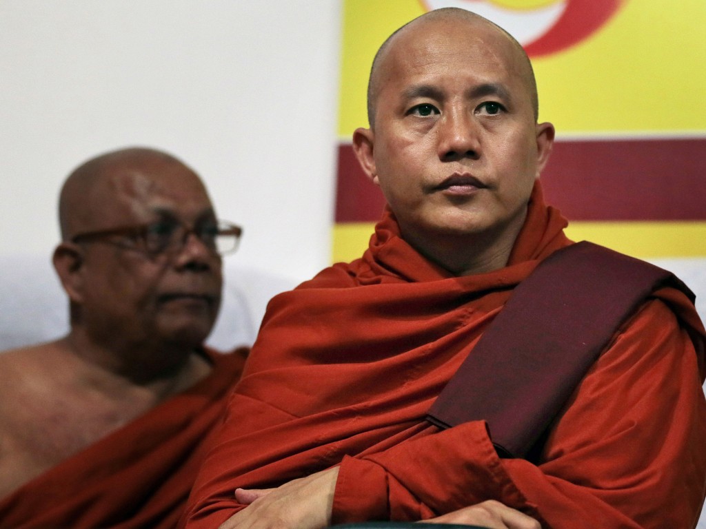 Myanmar’s radical Buddhist monk Ashin Wirathu attends a media briefing in Colombo, Sri Lanka, Tuesday, Sept. 30, 2014. Wirathu, known for his anti-Muslim campaign, has formalized an agreement with a like-minded Sri Lankan Bodu Bala Sena or Buddhist Power Force to work together to protect Buddhism which he says is challenged worldwide. (AP Photo/Eranga Jayawardena)