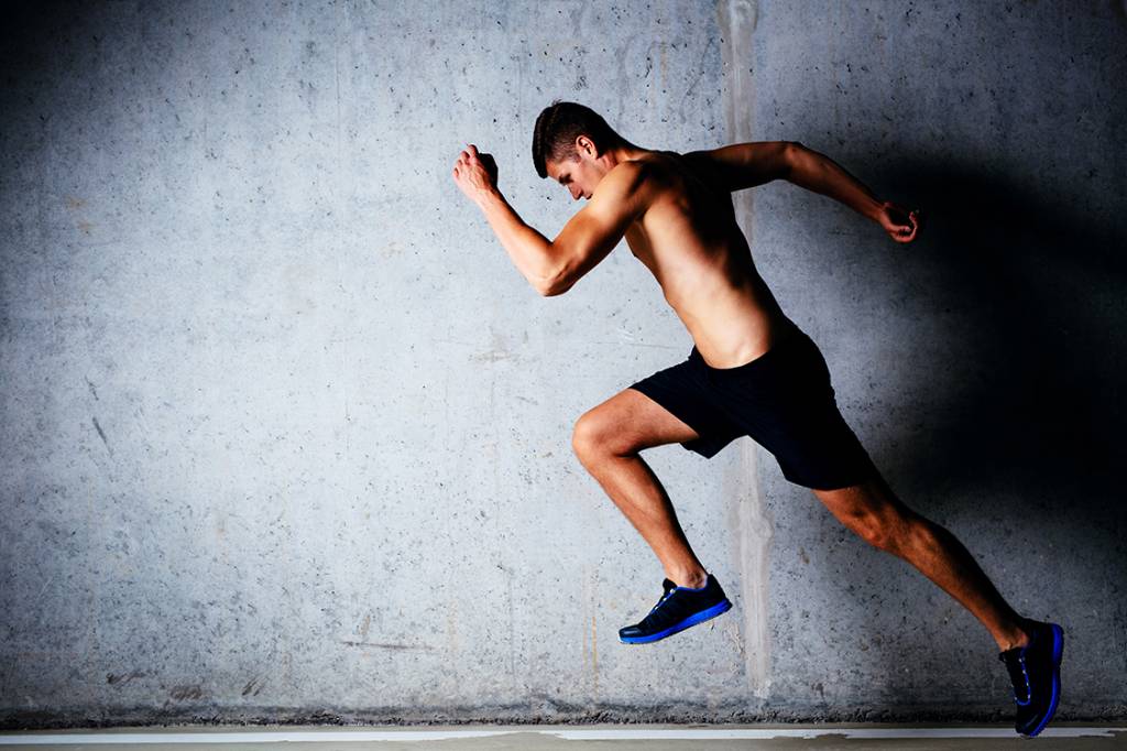 Runner against concrete wall