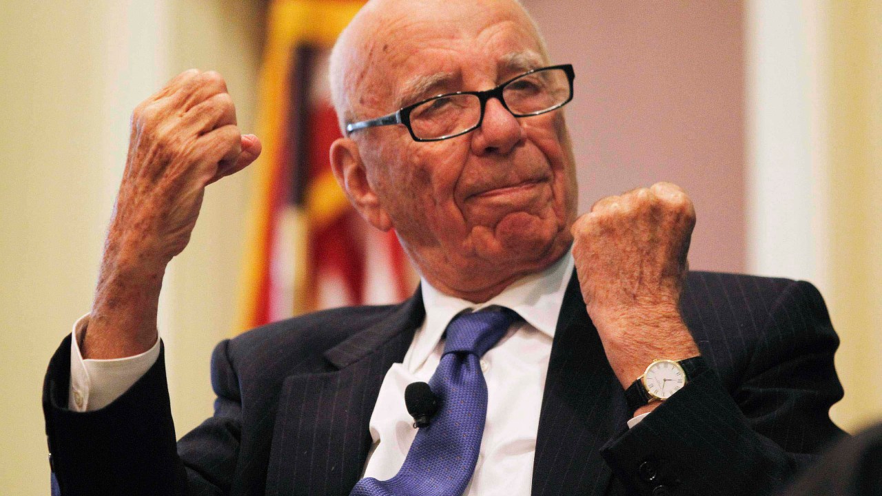 News Corp Chairman and CEO Rupert Murdoch gestures as he speaks at the "The Economics and Politics of Immigration" Forum in Boston