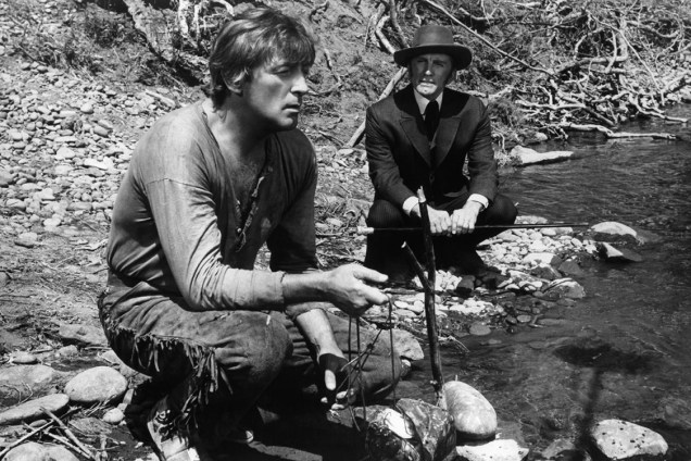 Kirk Douglas em cenas do filme "Desbravando o Oeste", 1967