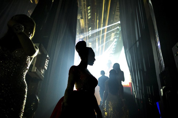 Contestants prepare to go on stage during the Miss International Queen 2015 transgender/transsexual beauty pageant in Pattaya