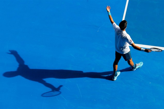 O tenista sérvio Novak Djokovic comemora ponto em partida contra Denis Istomin, do Uzbequistão, no Aberto da Austrália - 19/01/2017 O tenista sérvio Novak Djokovic comemora ponto em partida contra Denis Istomin, do Uzbequistão, no Aberto da Austrália - 19/01/2017