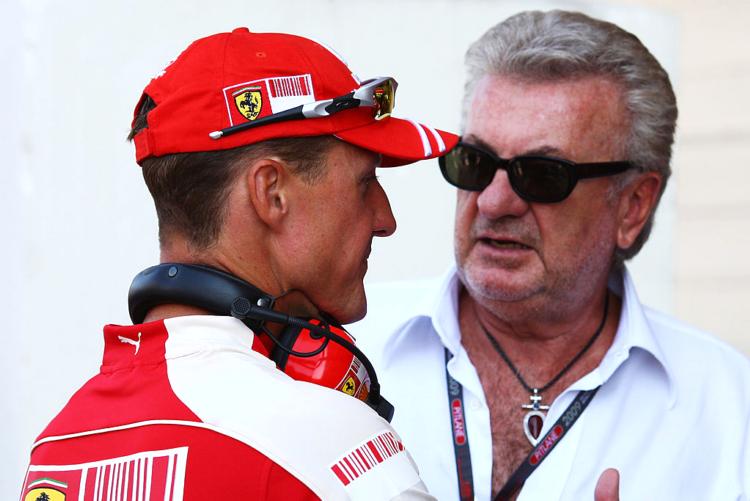 Michael Schumacher e o então agente Willi Weber. em 2009