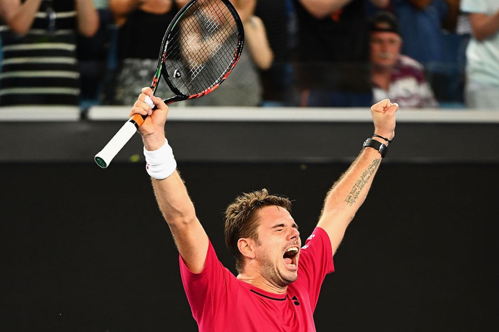 MELBOURNE, AUSTRALIA - JANUARY 16: Stan Wawrinka of Switzerland celebrates winning his first round match against Martin Klizan of Slovakia on day one of the 2017 Australian Open at Melbourne Park on January 16, 2017 in Melbourne, Australia. (Photo by Quinn Rooney/Getty Images)