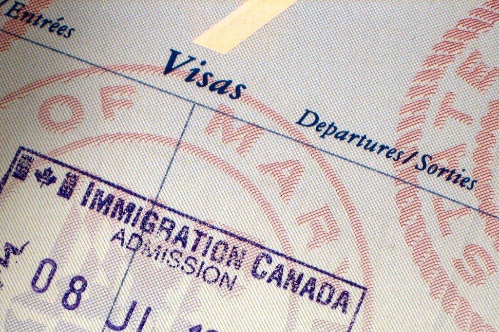 Passaporte com visto para o Canadá