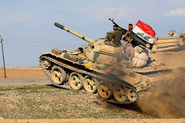 Brigada Abbas, que conta com apoio popular dos Xiitas, auxilia a Força Militar Iraquiana em combates na cidade de Mossul, Iraque, contra o Estado Islâmico - 08/03/2017 Brigada Abbas, que conta com apoio popular dos Xiitas, auxilia a Força Militar Iraquiana em combates na cidade de Mossul, Iraque, contra o Estado Islâmico - 08/03/2017