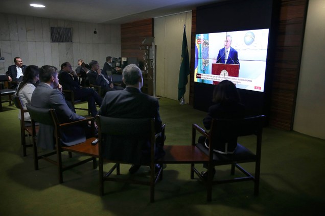 Brasília - Deputados e jornalistas assistem ao pronunciamento do presidente Michel Temer (José Cruz/Agência Brasil)
