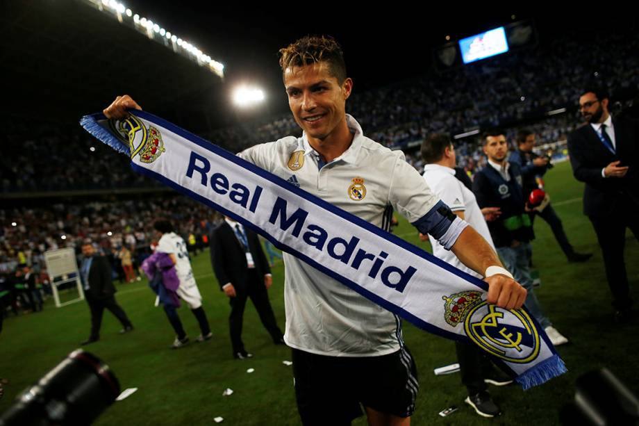 Cristiano Ronaldo, do Real Madrid, comemora títutlo do Campeonato Espanhol após vencer partida contra o Malaga