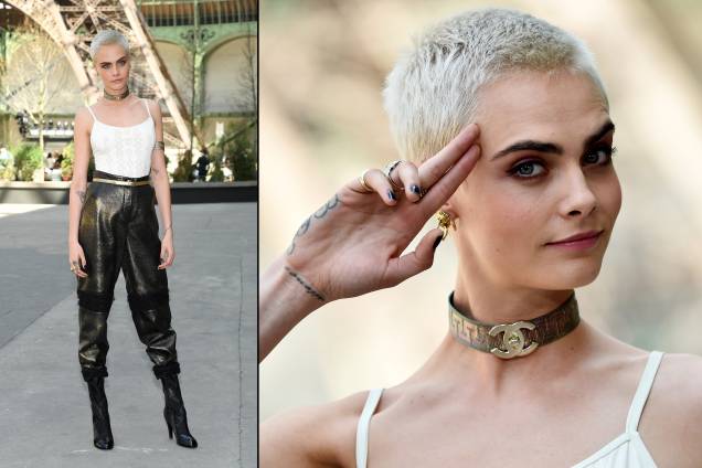 A modelo e atriz Cara <span>Delevingne compareceu ao desfile da Chanel com uma mistura de verão e inverno, com calça de modelo militar metalizada, blusa de alças com recortes e colar choker com o símbolo da grife. </span>