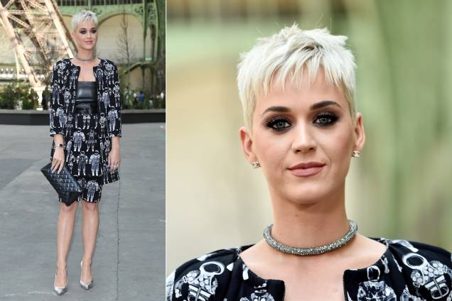 Katy Perry chamou a atenção no desfile da Chanel com um look que mesclava, em uma mesma estampa, bermuda, saia e casaco alongado. O corte moderno e a maquiagem forte no olho completaram o estilo descolado