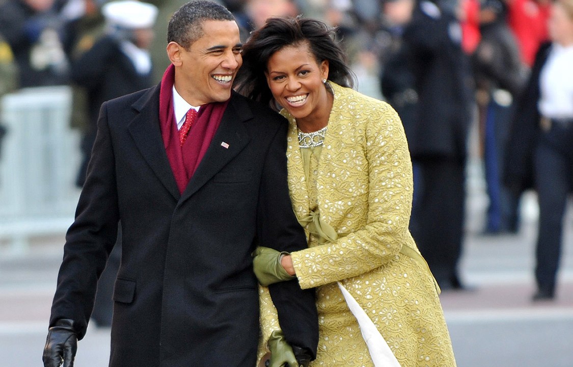 WASHINGTON - JANUARY 20: President Barack Obama and first lady Michelle Obama walk in the Inaugural Parade on January 20, 2009 in Washington, DC. Obama was sworn in as the 44th President of the United States, becoming the first African-American to be elected President of the US. (Photo by Ron Sachs-Pool/Getty Images)
