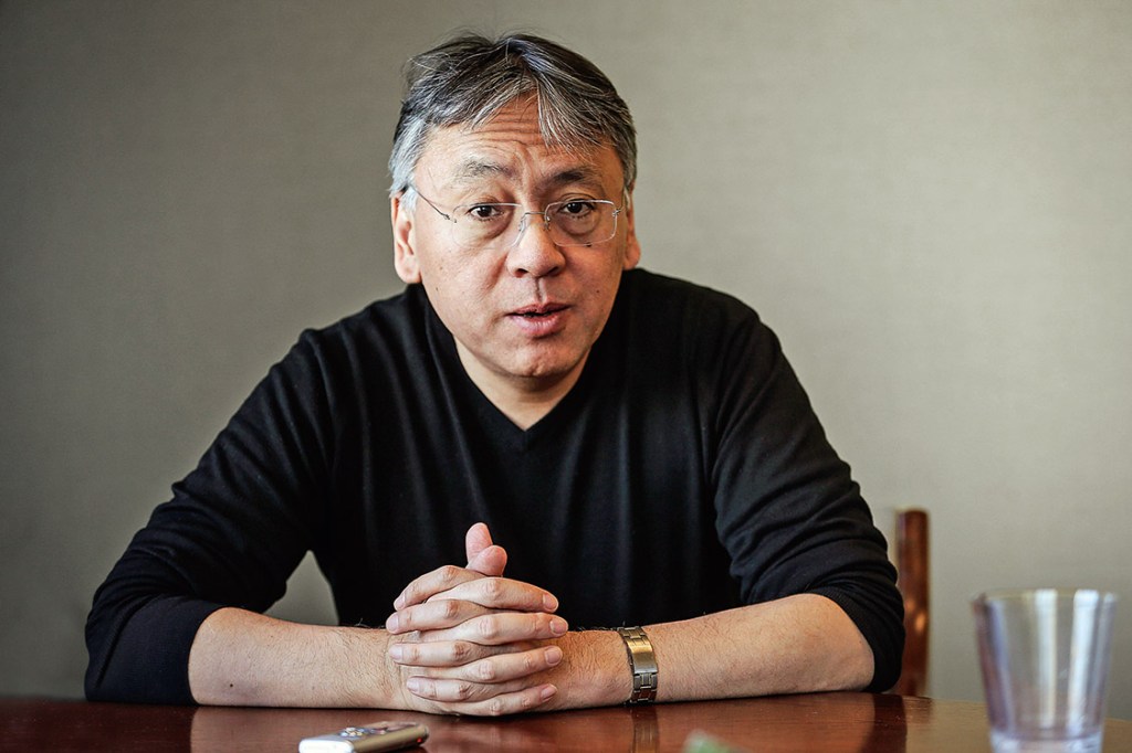 467340960 - Author of The Buried Giant Kazuo Ishiguro for interview at Random House. They made cookies with the logo of the cover of the book on them for a meet and greet after our interview. Toronto, March 17, 2015 Credito: David Cooper/Toronto Star/Getty Images