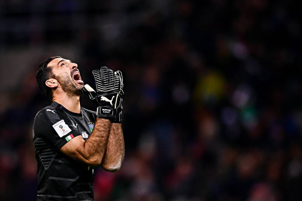 Italy's goalkeeper Gianluigi Buffon reacts during the FIFA World Cup 2018 qualification football match between Italy and Sweden, on November 13, 2017 at the San Siro stadium in Milan. / AFP PHOTO / Marco BERTORELLO