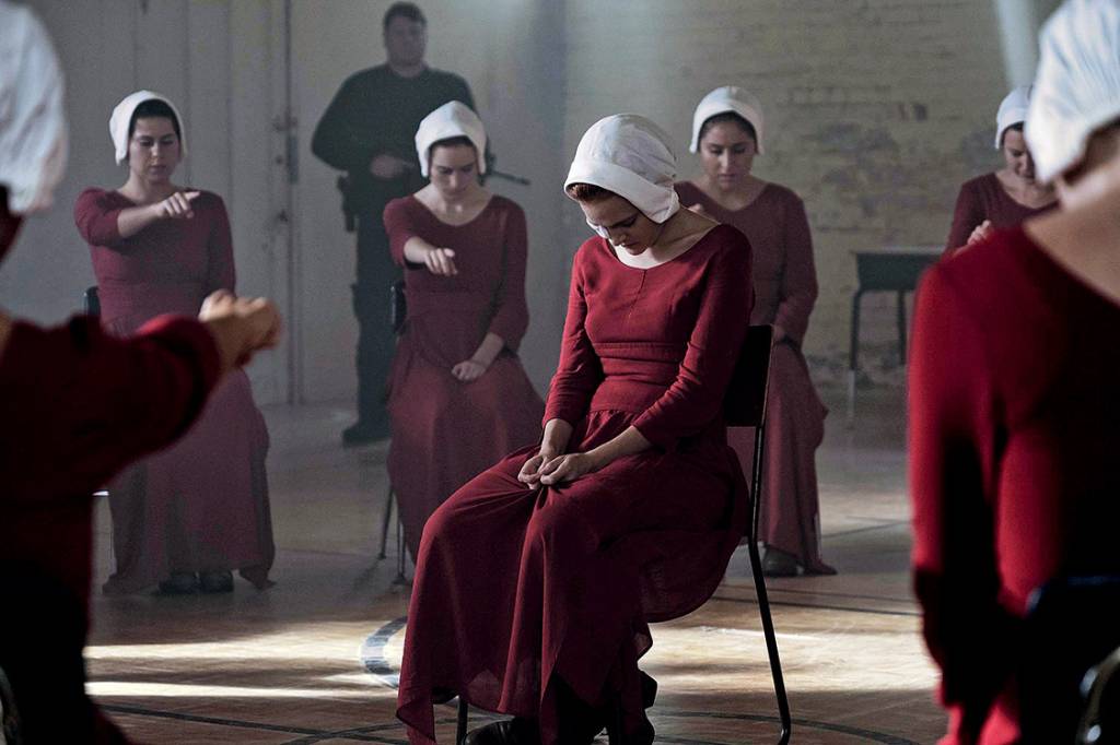 The Handmaid's Tale -- "Offred" -- Episode 101 -- Offred, one the few fertile women known as Handmaids in the oppressive Republic of Gilead, struggles to survive as a reproductive surrogate for a powerful Commander and his resentful wife. Janine (Madeline Brewer), shown. (Photo by: George Kraychyk/Hulu)