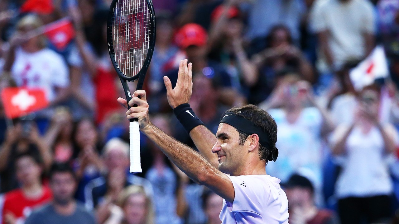 O tenista suíço Roger Federer comemora ao vencer o japonês Yuichi Sugita, em partida válida pela Copa Hopman, realizada na Perth Arena, na Austrália - 30/12/2017