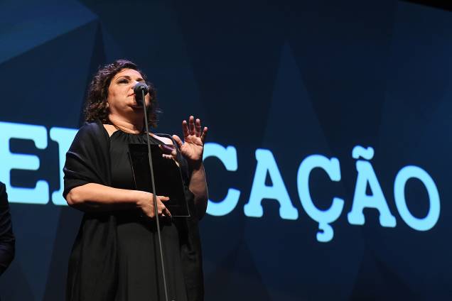 A professora Flávia Rezek recebeu o Prêmio Veja-se na categoria 'Educação'. Ela dirige uma escola pública que, apesar de situada em uma favela, está entre as quinze melhores do Brasil