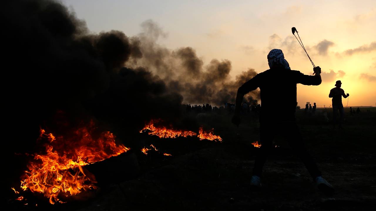 Imagens do dia - Confronto: Palestinos e tropas israelenses