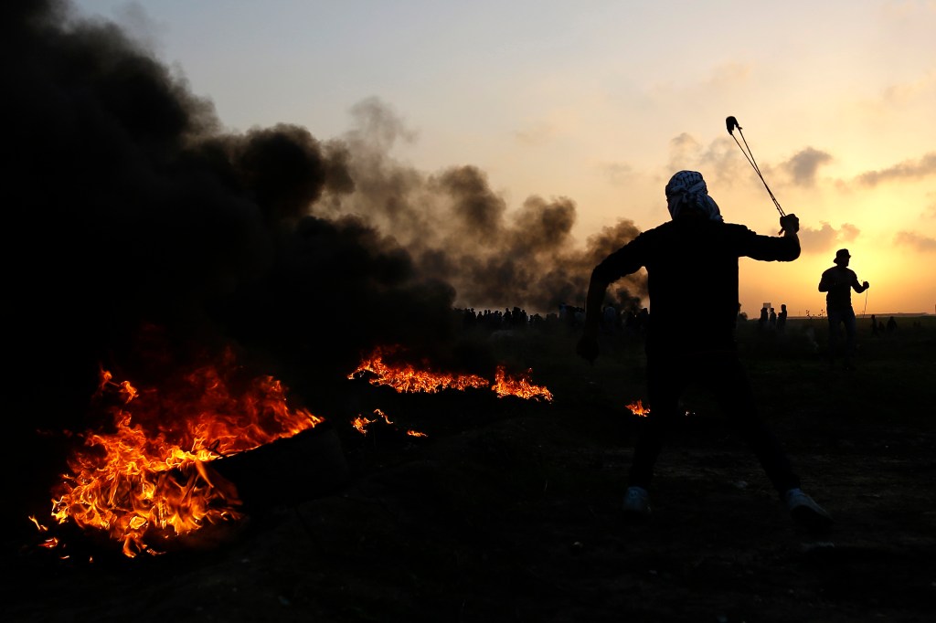 Imagens do dia - Confronto: Palestinos e tropas israelenses