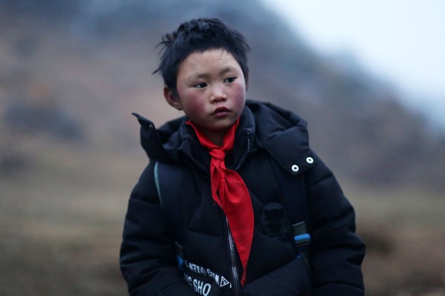 Wang Fuman, que ficou conhecido como "Menino Congelado", em Ludian na província de Yunnan, no sudoeste da China