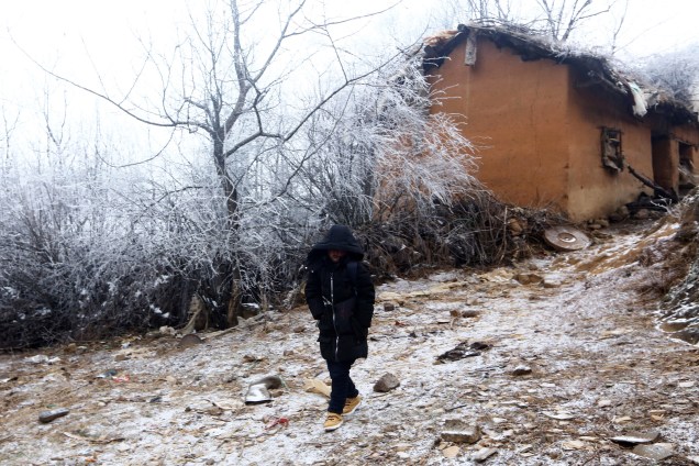 Wang Fuman, também conhecido como "Menino Congelado", em Ludian na província de Yunnan, no sudoeste da China