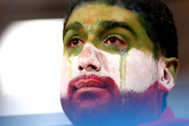 Torcedor chora após o Irã ser eliminado da Copa do Mundo, em empate com Portugal por 1 a 1 - 25/06/2018